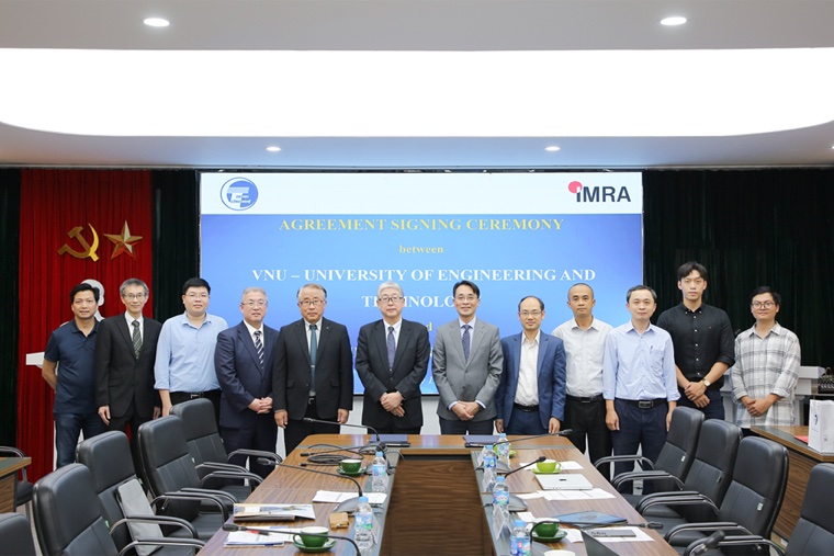 Participants from both organizations at the signing ceremony